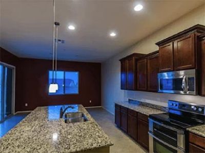  Interior painting job in a kitchen.